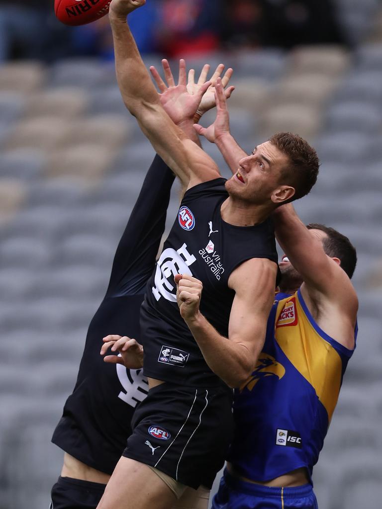 Jack Darling competes for a mark with Liam Jones.