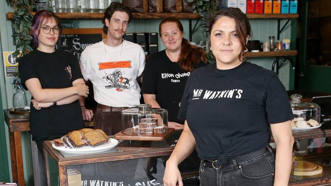 Jess Jenkins, owner of Mr Watkins Bar at Penrith pictured with staff, said her ‘spend per head is down’. Picture: John Appleyard