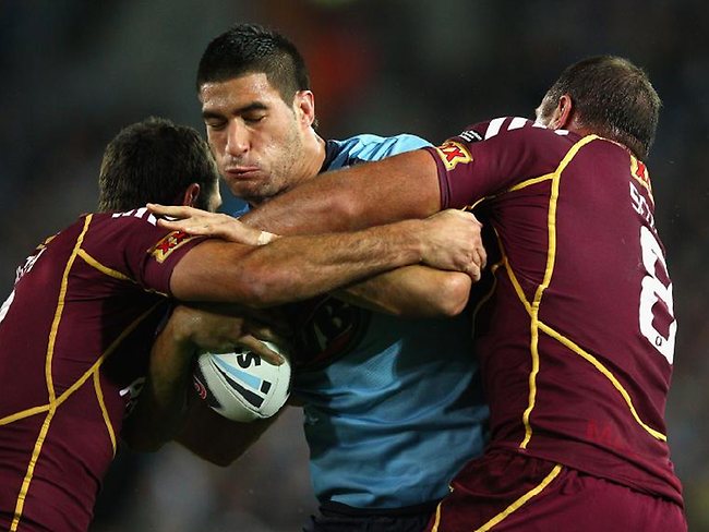 State of Origin II, 2012: NSW prop James Tamou takes on the Queensland line. Picture: Adam Ward