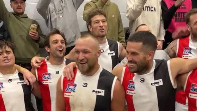 St Kilda City recruits James Magner (right) and Madison Andrews in the middle of the circle after their team’s win over Port Melbourne Colts.