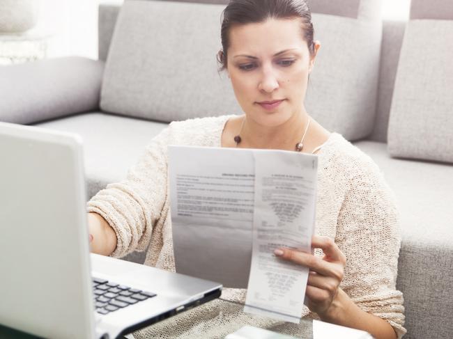 CAREERS: You could be able to claim more than you realise this tax season. Picture: iStockWoman in her 30s filling out tax information online