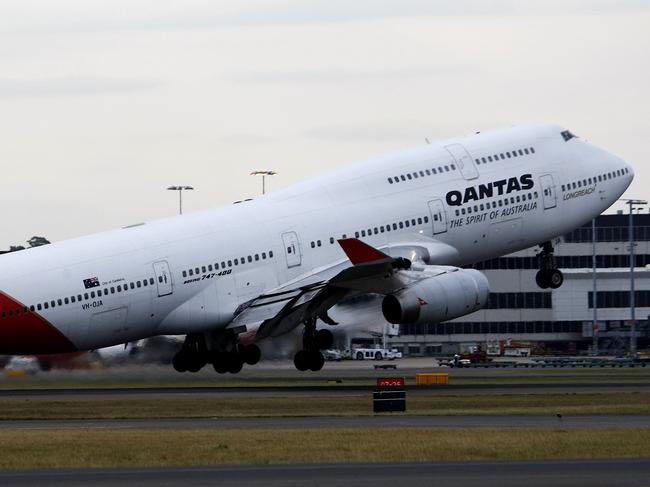 A Qantas Boeing 747-400 aircraft taking off at Sydney's Kingsford Smith Airport in Sydney.