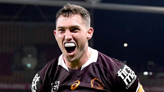 BRISBANE, AUSTRALIA - APRIL 30: Corey Oates of the Broncos celebrates scoring a try during the round 8 NRL match between the Brisbane Broncos and the Gold Coast Titans at Suncorp Stadium, on April 30, 2021, in Brisbane, Australia. (Photo by Bradley Kanaris/Getty Images)