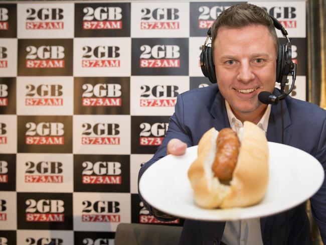 Ben Fordham at Revesby Worker's Club selling sausages to raise money for the Asbestos Disease Foundation. Pic: AAP Photo/Melvyn Knipe