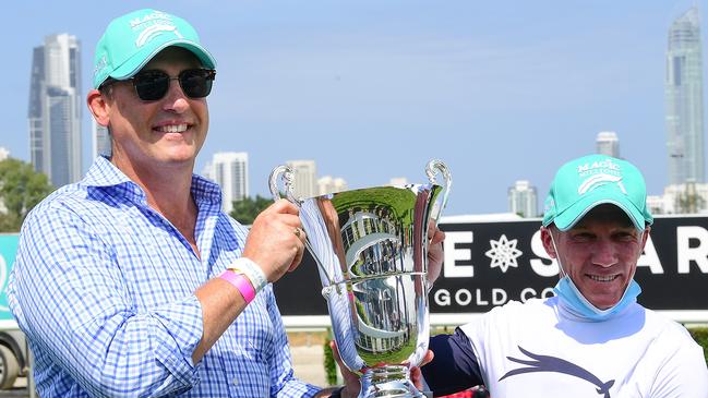 Trainer Tony Gollan and jockey Jim Byrne after Jonker won the Magic Millions Snippets. Picture: Trackside Photography