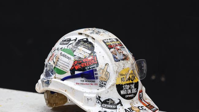 A workers hard hat outside a Probuild site in Elizabeth St. Melbourne. Picture: Ian Currie.