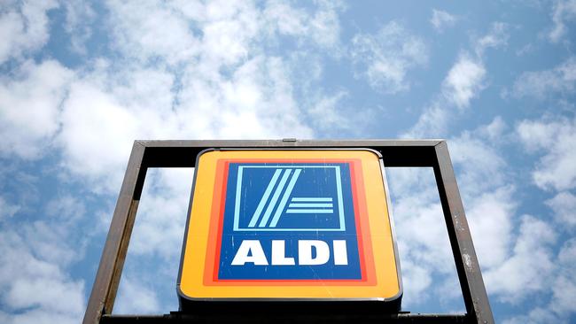 (FILES) This file photo taken on August 24, 2009, shows the sign of an Aldi store in Alexandria, Virginia.  The German discount grocery store giant unveiled a major US expansion plan on June 12, 2017, aiming to make it the third-largest US grocery chain in five years. The planned $3.4 billion expansion will add nearly 900 additional stores and  25,000 new jobs, the company said in a statement.  / AFP PHOTO / GETTY IMAGES NORTH AMERICA / ALEX WONG