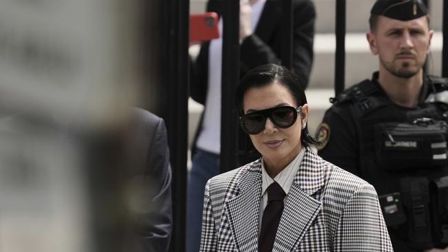 Kris Jenner, centre, the mother of Kim Kardashian, arrives for a trial regarding a robbery of millions of dollars in jewels. Picture: AP /Aurelien Morissard