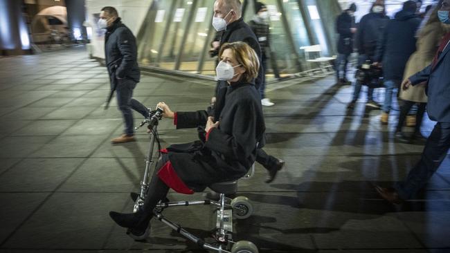 Malu Dreyer rides an electric scooter in Mainz on Sunday. Picture: Getty Images