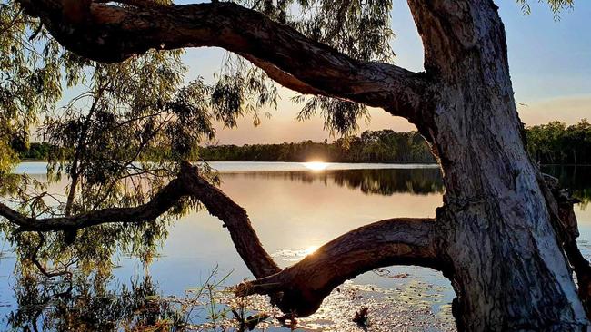 Beautiful reflections on Jabiru Lake capture the fading evening light. Picture: Roger Orford