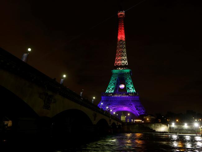 The Eiffel Tower in Paris illuminated in rainbow colours to pay homage to the victims of a shooting at a gay nightclub in Orlando. Picture: AFP