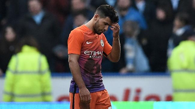 Manchester City's Argentinian striker Sergio Aguero reacts as he leaves the pitch.