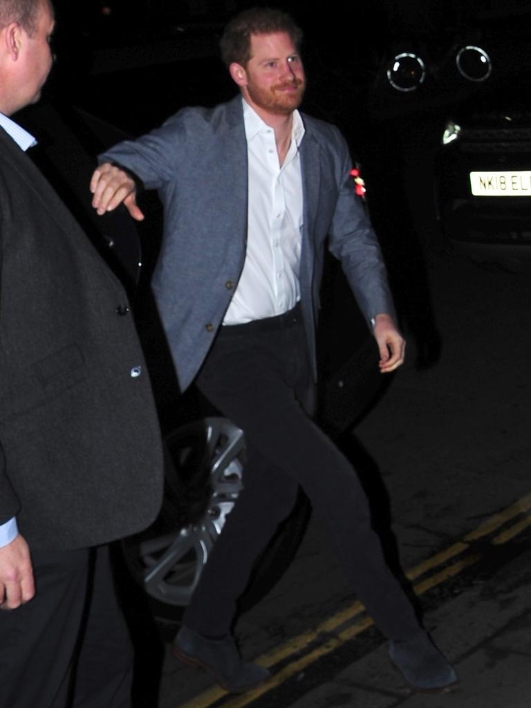 Harry was all smiles as he arrived at The Ivy in London on Sunday night. Picture: Backgrid Australia