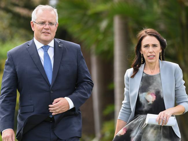 SYDNEY, AUSTRALIA - FEBRUARY 28: (R-L) New Zealand Prime Minister, Jacinda Ardern and Australian Prime Minster, Scott Morrison share some laughter walking across a lawn to a press conference held at Admiralty House on February 28, 2020 in Sydney, Australia. Ardern is in Australia for two days for the annual bilateral meetings with Australian Prime Minister Scott Morrison. (Photo by James D. Morgan/Getty Images)