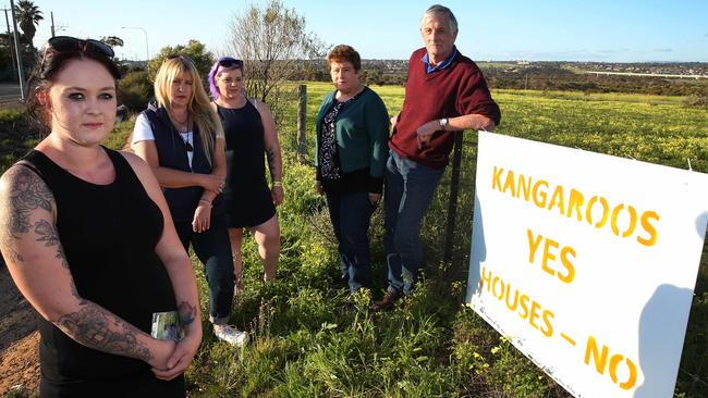 Protesters at the Seaford Meadows land, which is home to Gary the goat and kangaroos. Picture Dean Martin.