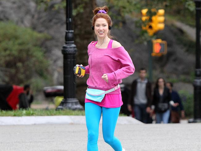 UK CLIENTS MUST CREDIT: AKM-GSI ONLY Ellie Kemper has a good time out in Central Park, filming a scene for her new TV series, "Unbreakable Kimmy Schmidt". The actress was decked out in retro workout gear including a blue fanny pack and a walkman in hand as she got in a workout. Ellie jammed to some music during her run and appeared to have a good time filming the scene. Pictured: Ellie Kemper Ref: SPL856380 021014 Picture by: AKM-GSI / Splash News