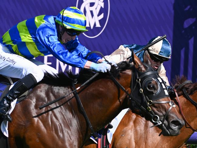 MELBOURNE, AUSTRALIA - FEBRUARY 17: Harry Coffey riding Makram defeats Craig Williams riding Jimmysstar in Race 9, the The Elms Handicap, during Melbourne Racing at Flemington Racecourse on February 17, 2024 in Melbourne, Australia. (Photo by Vince Caligiuri/Getty Images)