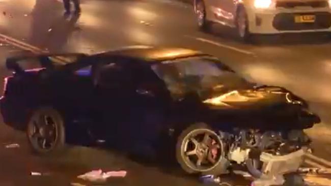 The badly damaged blue Nissan which Alec Vidot-Coleman was behind the wheel of when he crashed in West Ryde. Picture: 7 News