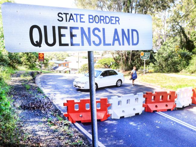 A stranded driver tries to re enter Tweed Heads NSW at the Queensland Border but due to current Queensland Closed Borders he is unable to drive the 75 metres to his home.Photo: Scott Powick Newscorp