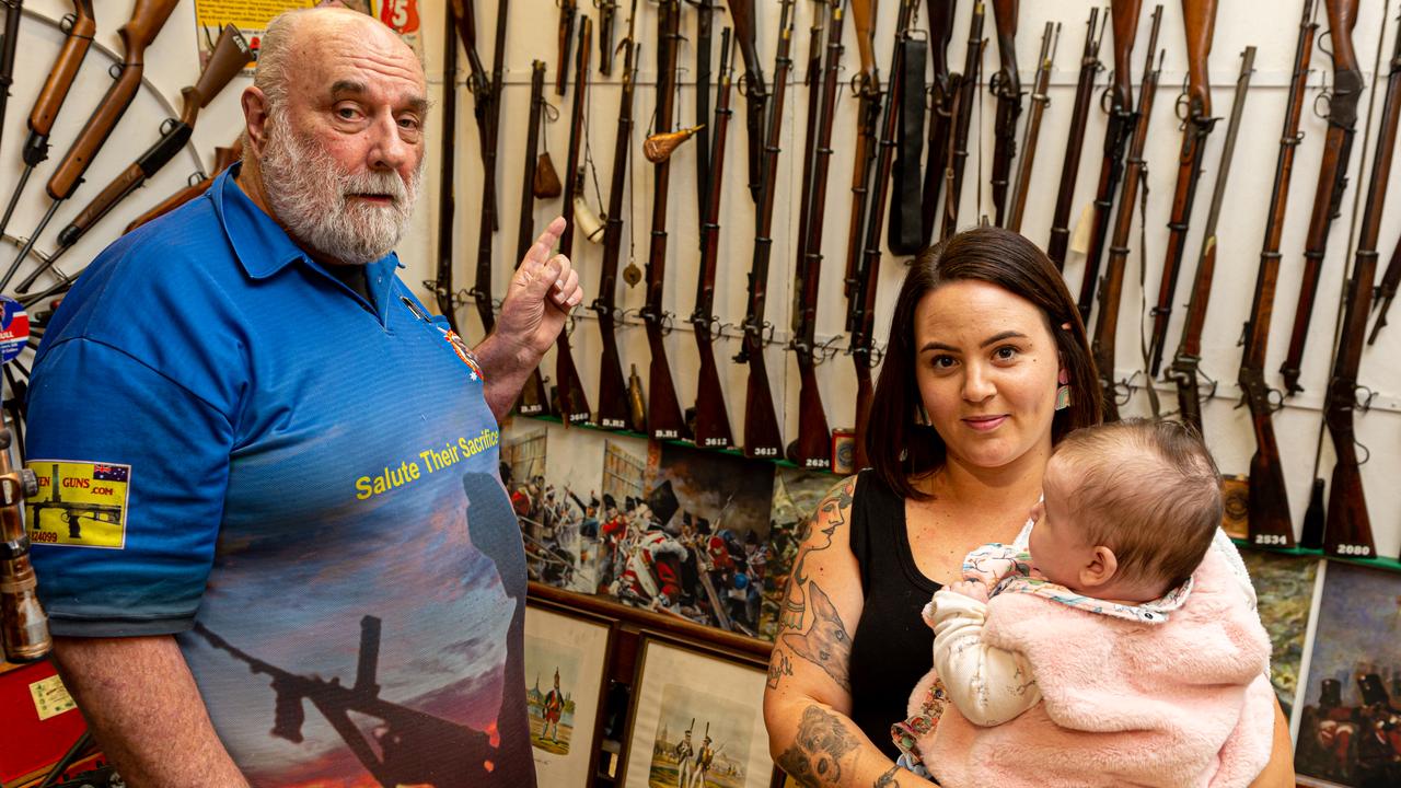 Ron Owen is certain The Thing, brought to his Gympie gun shop for inspection by Tenika Lawther, with Oceana, is a bullet. Picture: Paul Beutel