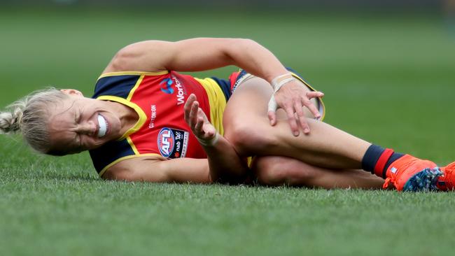 *This picture has been selected as one of the Best of the Year Sports images for 2019*  Erin Phillips of the Crows after injuring her knee during the AFLW grand final match between the Adelaide Crows and the Carlton Blues at Adelaide Oval in Adelaide, Sunday, March 31, 2019. (AAP Image/Kelly Barnes) NO ARCHIVING, EDITORIAL USE ONLY