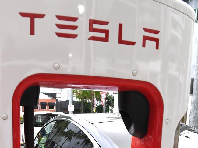 A stock image of a Tesla model X car being charged in Brisbane, Wednesday, February 27, 2019. (AAP Image/Dan Peled) NO ARCHIVING