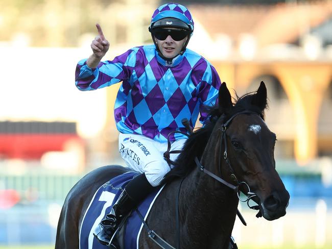 SYDNEY, AUSTRALIA - APRIL 13: Declan Bates riding Pride of Jenni wins Race 8 Queen Elizabeth Stakes during Sydney Racing: The Championships at Royal Randwick Racecourse on April 13, 2024 in Sydney, Australia. (Photo by Jeremy Ng/Getty Images)