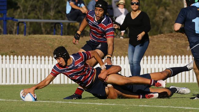 Dion Samuela touches down for The Southport School. Picture AAP/David Clark