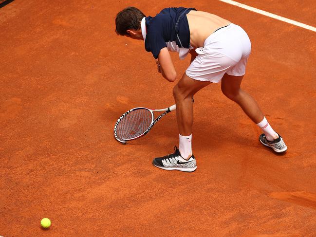 Daniil Medvedev smashes his racket in frustration playing against Nick Kyrgios. Picture: Getty Images