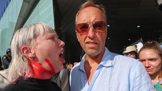 A man cops an earful as he tries to enter the conference. Picture: Alex Coppel.