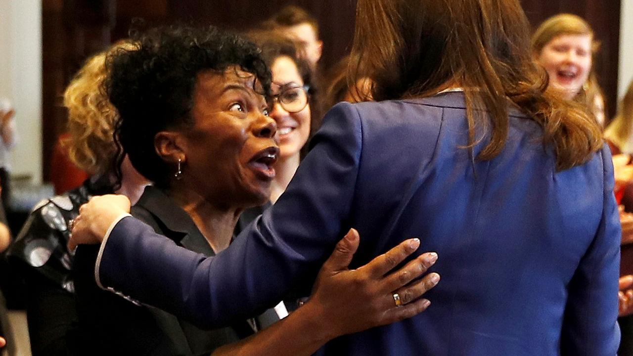 Kate greets Professor Jacqueline Dunkley-Bent, one of the midwives who helped to deliver her daughter Princess Charlotte of Cambridge, on February 27, 2018. Picture: AFP PHOTO / POOL / PETER NICHOLLS.