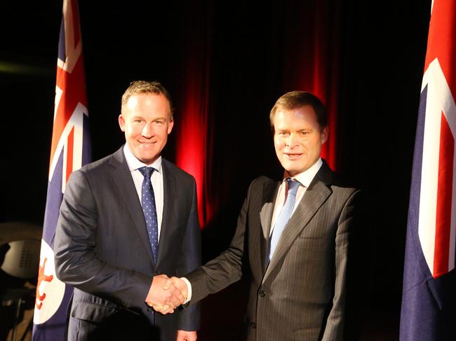 Premier Will Hodgman signing an agreement at Hobart City Hall with Professor Peter Rathjen - University of Tasmania Vice-Chancellor.