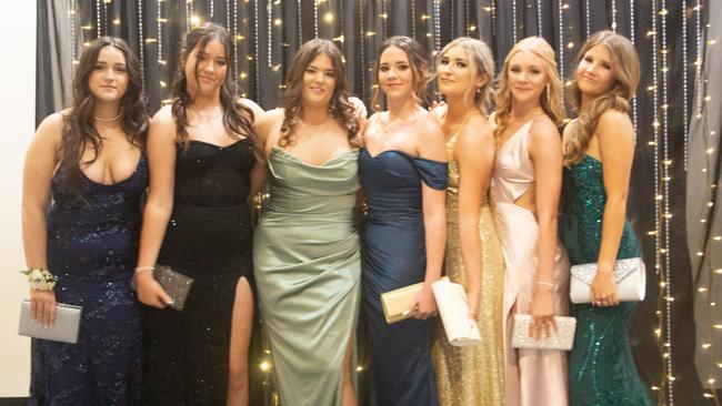 Charlotte Caldow, Jenae Decourcy, Tia Moore, Emma Walker, Mia Lurhman, Annalise Smart and Josie Fowler at the Maroochydore State High School formal 2023.