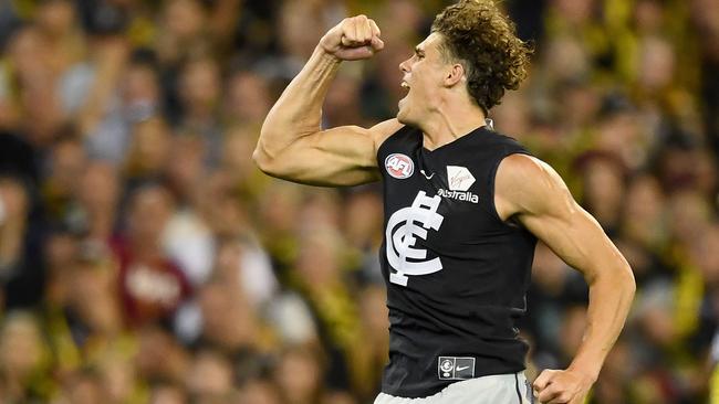 Charlie Curnow celebrates a goal for Carlton against Richmond.