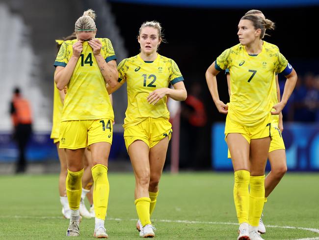 MARSEILLE, FRANCE - JULY 31: Alanna Kennedy #14 of Team Australia shows her dejection after losing the Women's group B match between Australia and United States during the Olympic Games Paris 2024 at Stade de Marseille on July 31, 2024 in Marseille, France. (Photo by Alex Livesey/Getty Images)