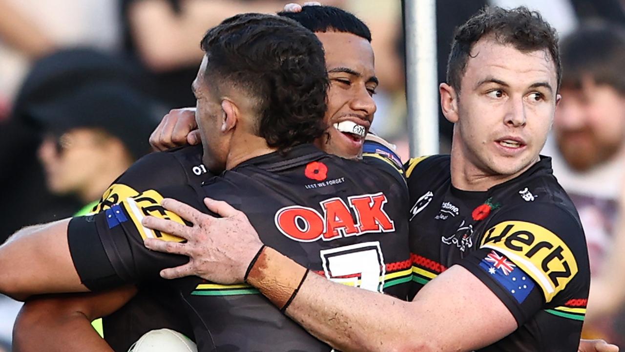 Panthers Players Lead Their Team Into The Stadium Background