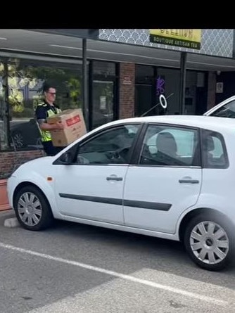 A police officer during the Operation Eclipse raids. Picture: SAPOL / SA Police