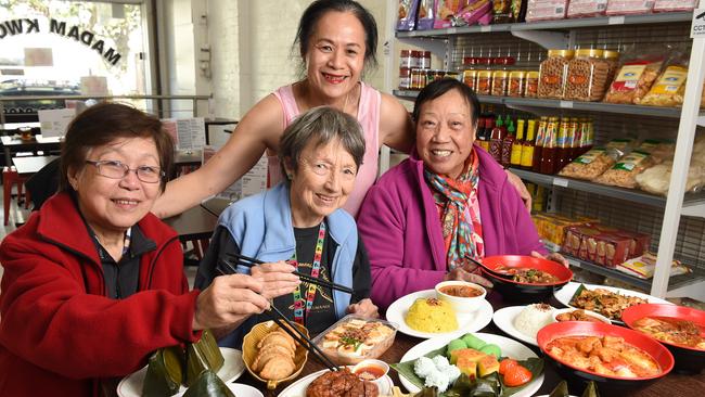 Rose Chong with customers and one of her banquets at Madam Kwong's Nyonya in Box Hill.