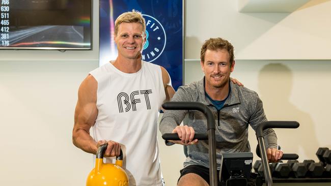 Former AFL player Nick Riewoldt with former cricketer George Bailey at the launch of the Body Fit Training studio in Hobart. Picture: Alastair Bett