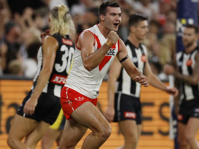 MELBOURNE , AUSTRALIA. March 15 , 2024.  AFLÃ Round 1. Collingwood vs Sydney Swans at the MCG.  Sydneys Logan McDonald celebrates a 3rd quarter goal   . Pic: Michael Klein