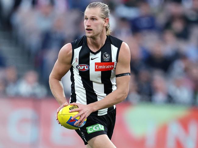 Tom Wilson swapped the round ball for the Sherrin. Picture: Michael Klein