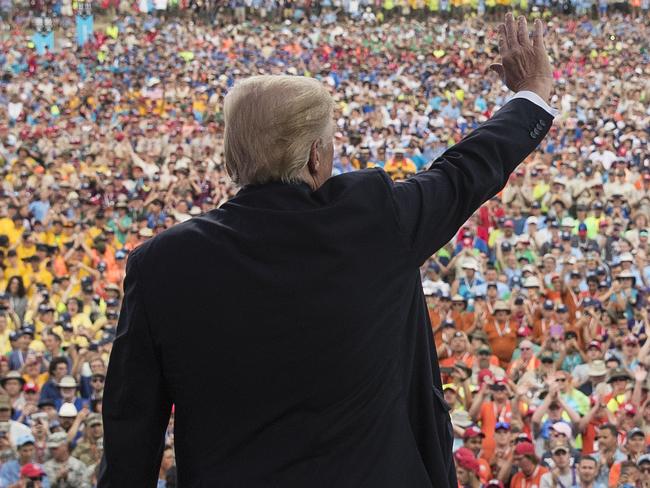 FILE - In this July 24, 2017 file photo, President Donald Trump waves to the crowd after speaking at the 2017 National Scout Jamboree in Glen Jean, W.Va. The Boy Scouts are denying a claim by President Donald Trump that the head of the youth organization called the president to praise his politically aggressive speech to the Scoutsâ€™ national jamboree.  (AP Photo/Carolyn Kaster, File)