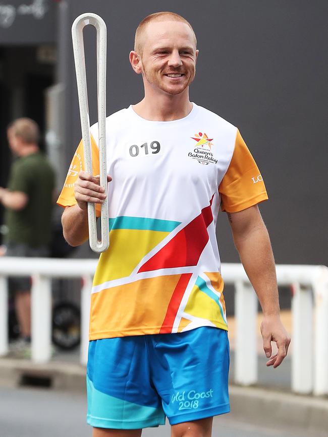 Jackson carrying the baton at the Commonwealth Games in Brisbane in 2018. Picture: Nikki Davis-Jones