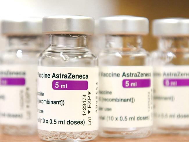 A picture taken on March 20, 2021 shows empty vials of  AstraZeneca vaccines against the Covid-19 in Ede, where the vaccination campaign with the AstraZeneca vaccine resumes. (Photo by Piroschka van de Wouw / ANP / AFP) / Netherlands OUT