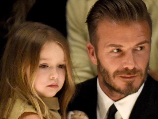 LOS ANGELES, CA - APRIL 16: Harper Beckham (L) and David Beckham attend the Burberry "London in Los Angeles" event at Griffith Observatory on April 16, 2015 in Los Angeles, California. (Photo by Jeff Vespa/Getty Images for Burberry)