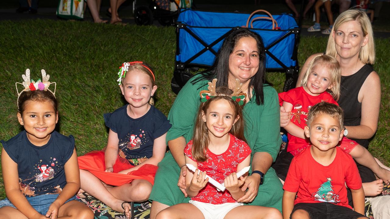 Lexi De Silva, Ada Clark, Isla Beahan, Michelle Beahan, Jayden De Silva, Macy Clark and Susan Clark at Carols in the Gardens, Mackay Regional Botanic Gardens, Saturday 2 December 2023 Picture:Michaela Harlow