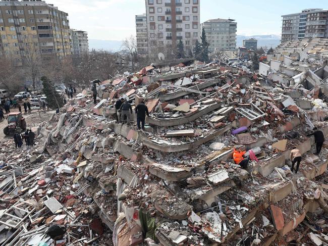 Civilians look for survivors under the rubble of collapsed buildings in Kahramanmaras. Some of the heaviest devastation occurred near the quake's epicentre between Kahramanmaras and Gaziantep. Picture: AFP