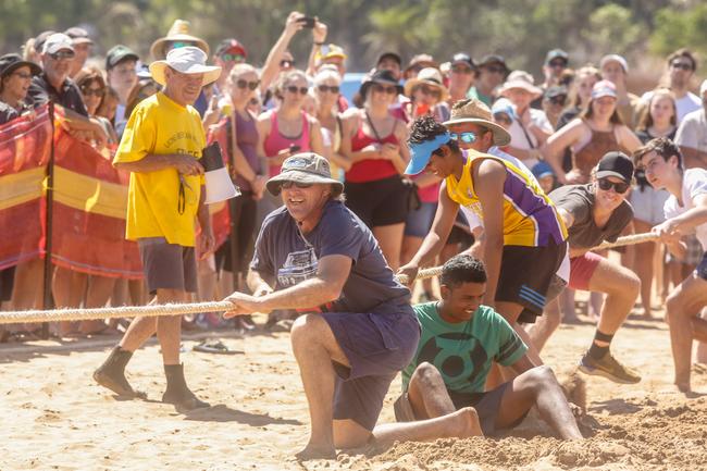 The United Nations team exists in the heats of the men’s tug-of-war at the 2019 Beer Can Regatta at Mindel Beach. Pic Glenn Campbell