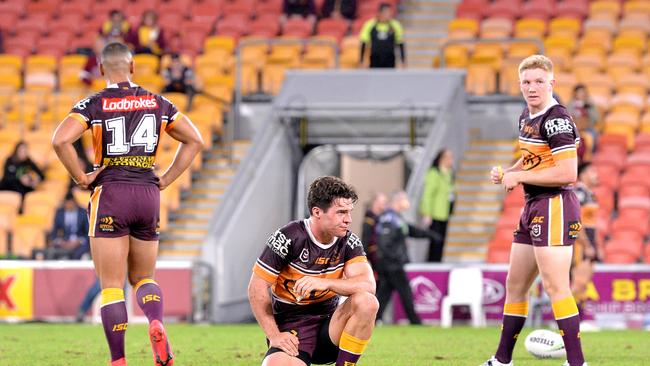 Brodie Croft and the Broncos react after their loss to the Titans. Picture: Bradley Kanaris/Getty Images