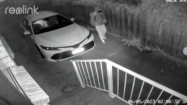 A still from CCTV security footage showing suspicious activity at a home in Blackmans Bay on the weekend.